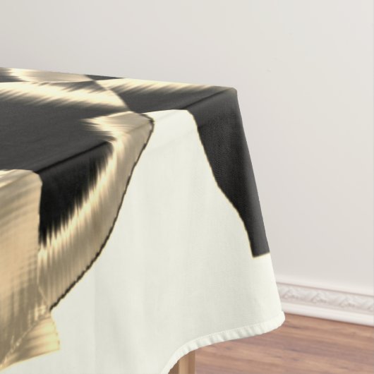 Schwarz-Beige-Schrott, zerstörte Bänder auf klarem Tischdecke (Beispiel)