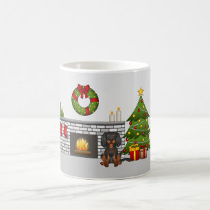 Schwarz-brauner Cavalier Hund in einem Weihnachtsz Kaffeetasse