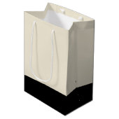 Schwarz-Eggshell, weißer Unisex-Farbblock Mittlere Geschenktüte (Vorderseite Schrägansicht)