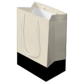 Schwarz-Eggshell, weißer Unisex-Farbblock Mittlere Geschenktüte (Rückseite Schrägansicht)