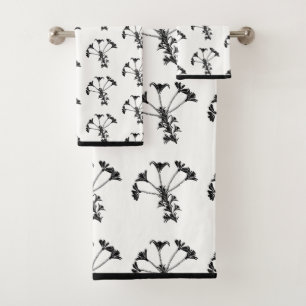 Schwarz-Flor-Wiederholung auf weißem Set