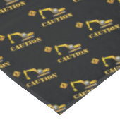 Schwarz-Gelb-Konstruktionsabziehwagen Vorsicht Tischdecke (Schrägansicht)