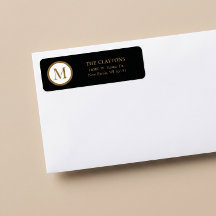 Schwarz-Gold-Monogramm mit zentralem Siegel