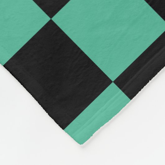 Schwarz-Grün-karierte Fleecedecke (Ecke)
