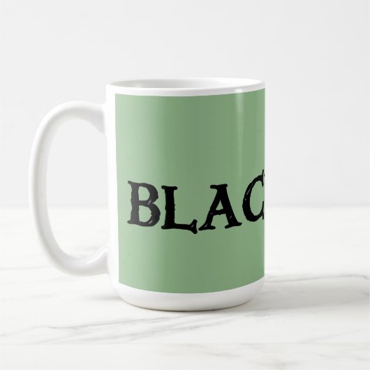 Schwarz-Irisch große grüne Tasse (Links)