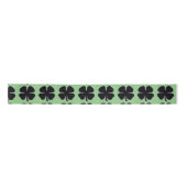 Schwarz Kleber, grüner Bandspool Satinband (Vorderseite)