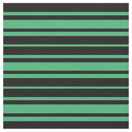 Schwarz-Meer-Grünmuster Stoff (Nahaufnahme)