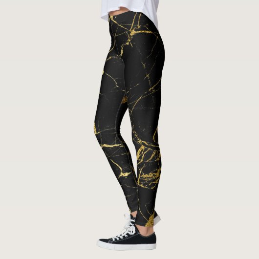 Schwarz mit goldfarbenem Marmormuster Leggings (Links)