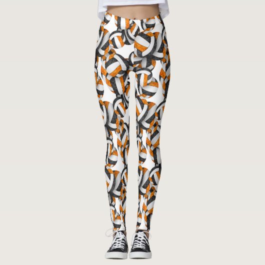 Schwarz-Orange-Mannschaftsfarben Volleyballs-Muste Leggings (Vorderseite)