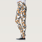 Schwarz-Orange-Mannschaftsfarben Volleyballs-Muste Leggings (Links)
