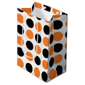 Schwarz-Orange-Polka-Punkte Mittlere Geschenktüte (Vorderseite Schrägansicht)