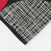 Schwarz, rot, kariertes geometrisches Muster. Fleecedecke (Ecke)