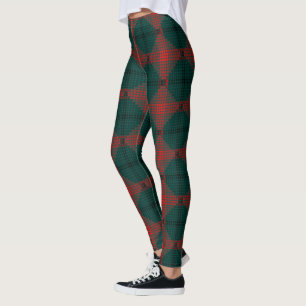 Schwarz-rot-Kugeln oder Löcher über grünem Hinterg Leggings