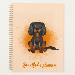 Schwarz & Tan Cavalier King Charles Hund auf Orang Planer