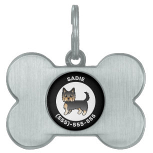 Schwarz und Braun Yorkshire Terrier mit Namen und Tiermarke