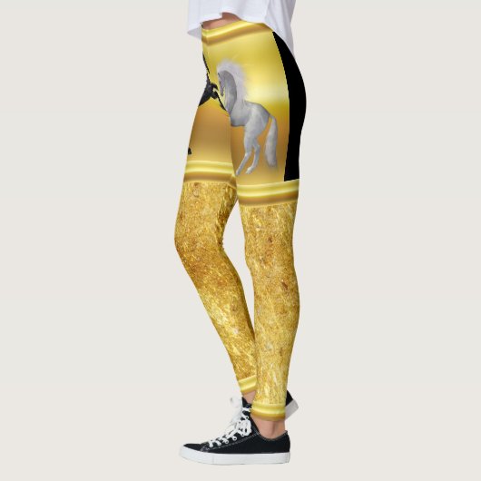 Schwarz und ein weißes Pferd, das kämpft Leggings (Links)