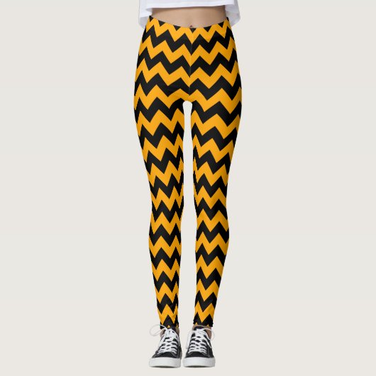 Schwarz und Orange ZigZag Zickzack Leggings (Vorderseite)