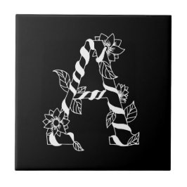 Schwarz-Weiß-Buchstabe "A" mit Twining-Blume Fliese