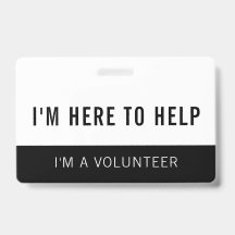 Schwarz-Weiß-Freiwillige hier, um Abzeichen zu hel