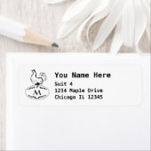 Schwarz-Weiß-Hen auf einem Monogramm-Ei (Insitu)