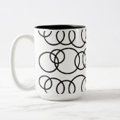 Schwarz-Weiß-Kreise Blubmuster Zweifarbige Tasse (Links)