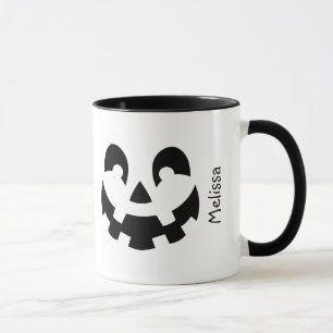 Schwarz-Weiß-Kürbisgesicht mit Namen Halloween Tasse