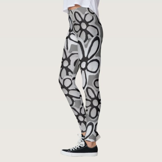Schwarz-Weiß-Milchmuster Leggings (Links)