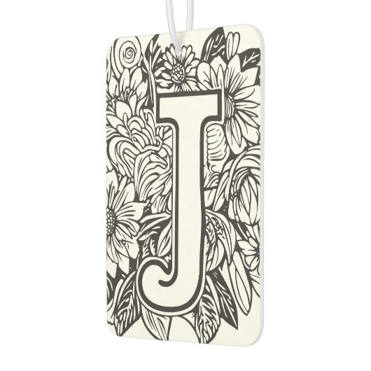 Schwarz-Weiß-Monogramm-Tinte im Tattoo-Style, Blum Autolufterfrischer (Links)
