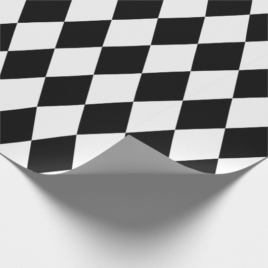 Schwarz-Weiß-Muster aus Diamant-Harlequin Geschenkpapier (Ecke)