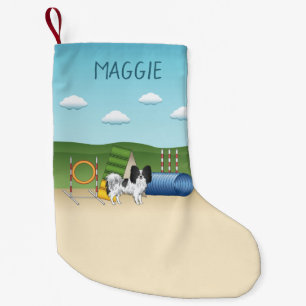 Schwarz-Weiß-Papillen mit Agility Kleiner Weihnachtsstrumpf
