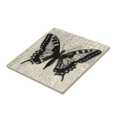 Schwarz-Weiß-Schmetterling im Hintergrund Fliese (Seite)