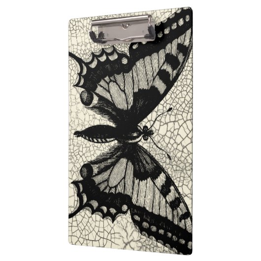 Schwarz-Weiß-Schmetterling im Hintergrund Klemmbrett (Links)