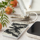 Schwarz-Weiß-Schmetterling im Hintergrund Schlüsselanhänger (Vorderseite rechts)