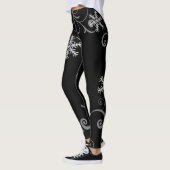 Schwarz-Weiß-Schneeflocken-Wirbel Leggings (Links)