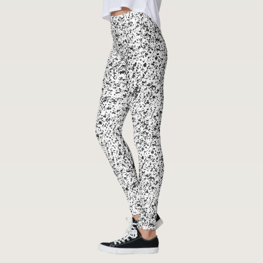 Schwarz-Weiß-Spritzer Leggings (Links)