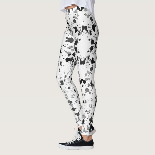 Schwarz-Weiß-Spritzer Leggings (Links)