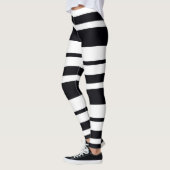 Schwarz-Weiß-Streifen Leggings (Links)