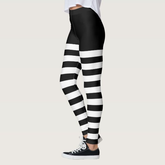 Schwarz-Weiß-Streifen Leggings (Links)