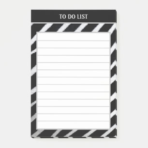 Schwarz-Weiß-Zebra-Muster, das in einer Liste aufg Post-it Klebezettel