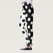 Schwarz-weiße halbe Farbtrennung inverse Polka-Pun Leggings (Links)
