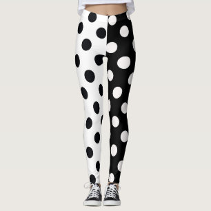 Schwarz-weiße halbe Farbtrennung inverse Polka-Pun Leggings