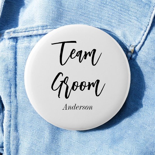 Schwarz-weiße Hochzeit im Team Groom Button