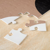 Schwarz, weiße Kreise, brauner Hintergrund. Puzzle (Seite)