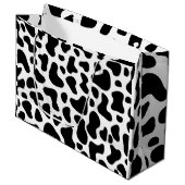 Schwarz-weiße Kuhpflaster Große Geschenktüte (Vorderseite Schrägansicht)