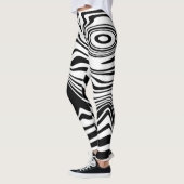 Schwarz-weiße Leggings mit Streifen oder Farbauswa (Links)