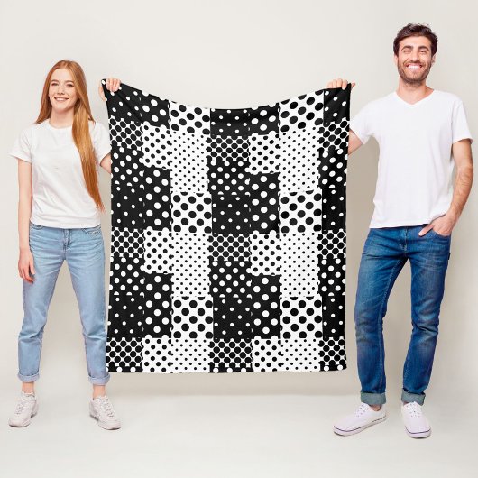Schwarz-weiße Mode mit Punkten im Design Fleecedecke
