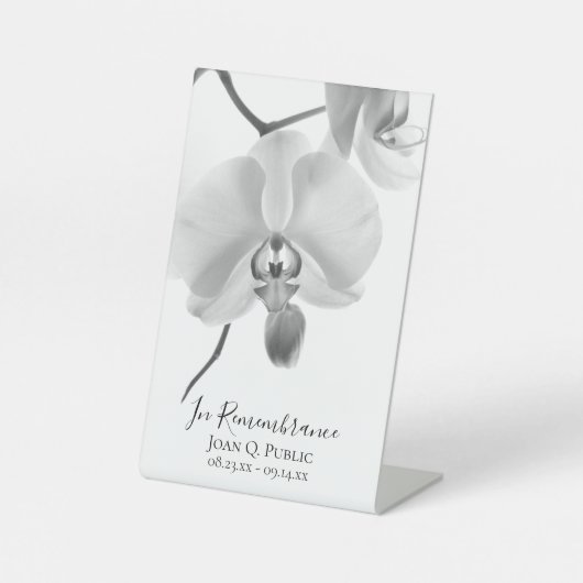 Schwarz-weiße Orchideen auf Stammzelebration des L Sockelschild (Vorderseite)