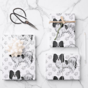 Schwarz-weiße Papillon-Cartoon-Hunde mit Pfoten Geschenkpapier Set
