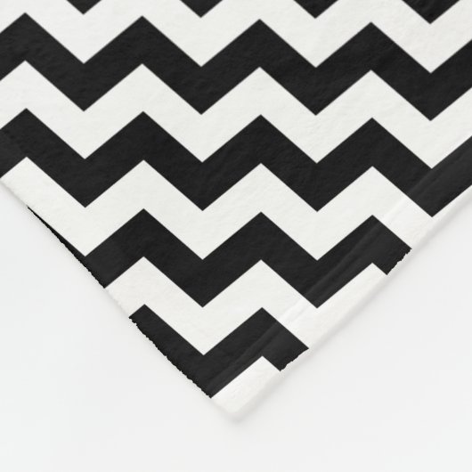 Schwarz-weiße rote Unterseite beschuht Fleecedecke (Ecke)