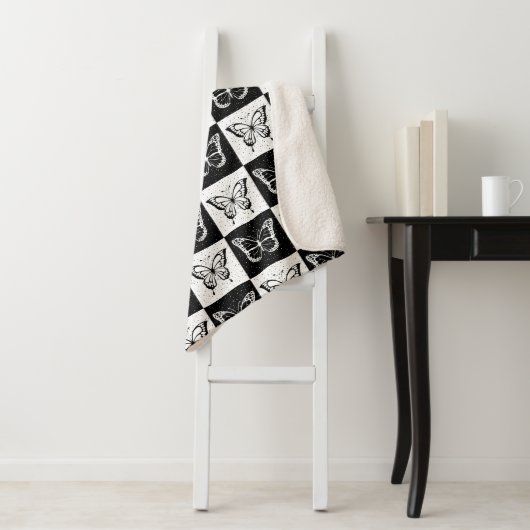Schwarz-weiße Schmetterlingssicherung Sherpadecke (Beispiel)